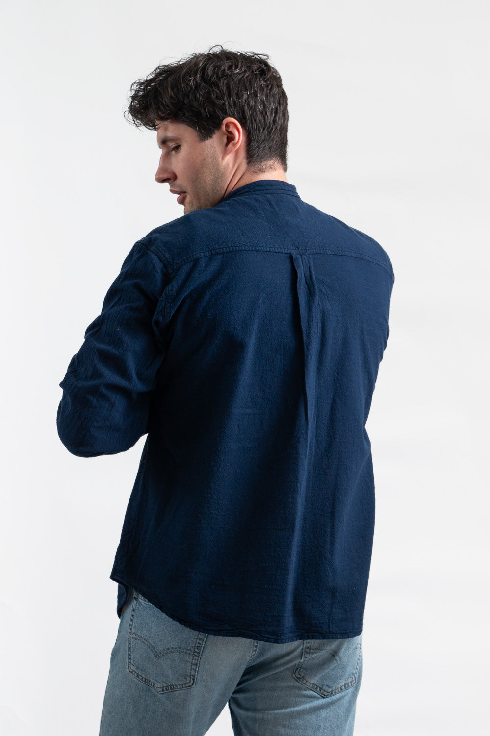 Model wearing Utku Collar Shirt in Lyon blue — handmade in Ecuador