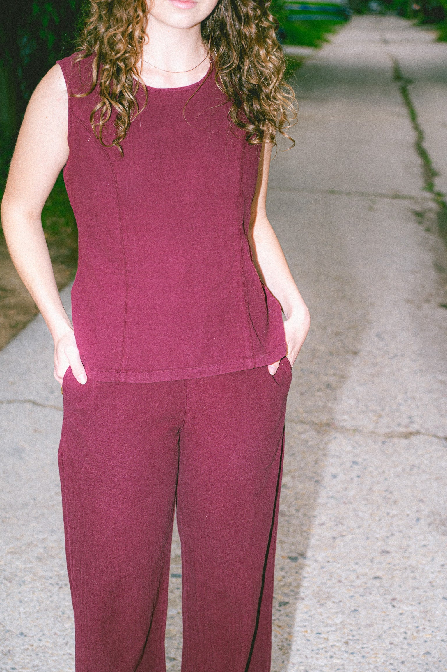 Model wearing Utku Straight Pants in Dusky Madder Violet — handmade in Ecuador