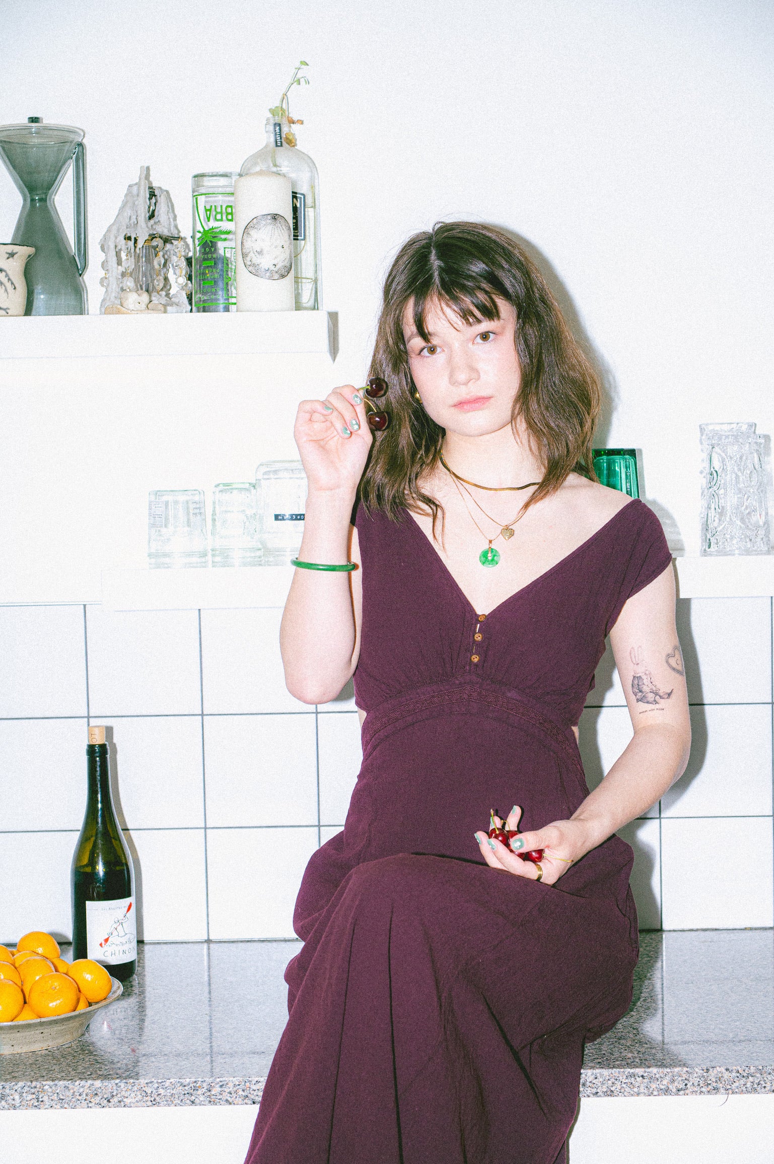 Model wearing Utku Cutout Crinkle Cotton Dress in Dusky Madder Violet