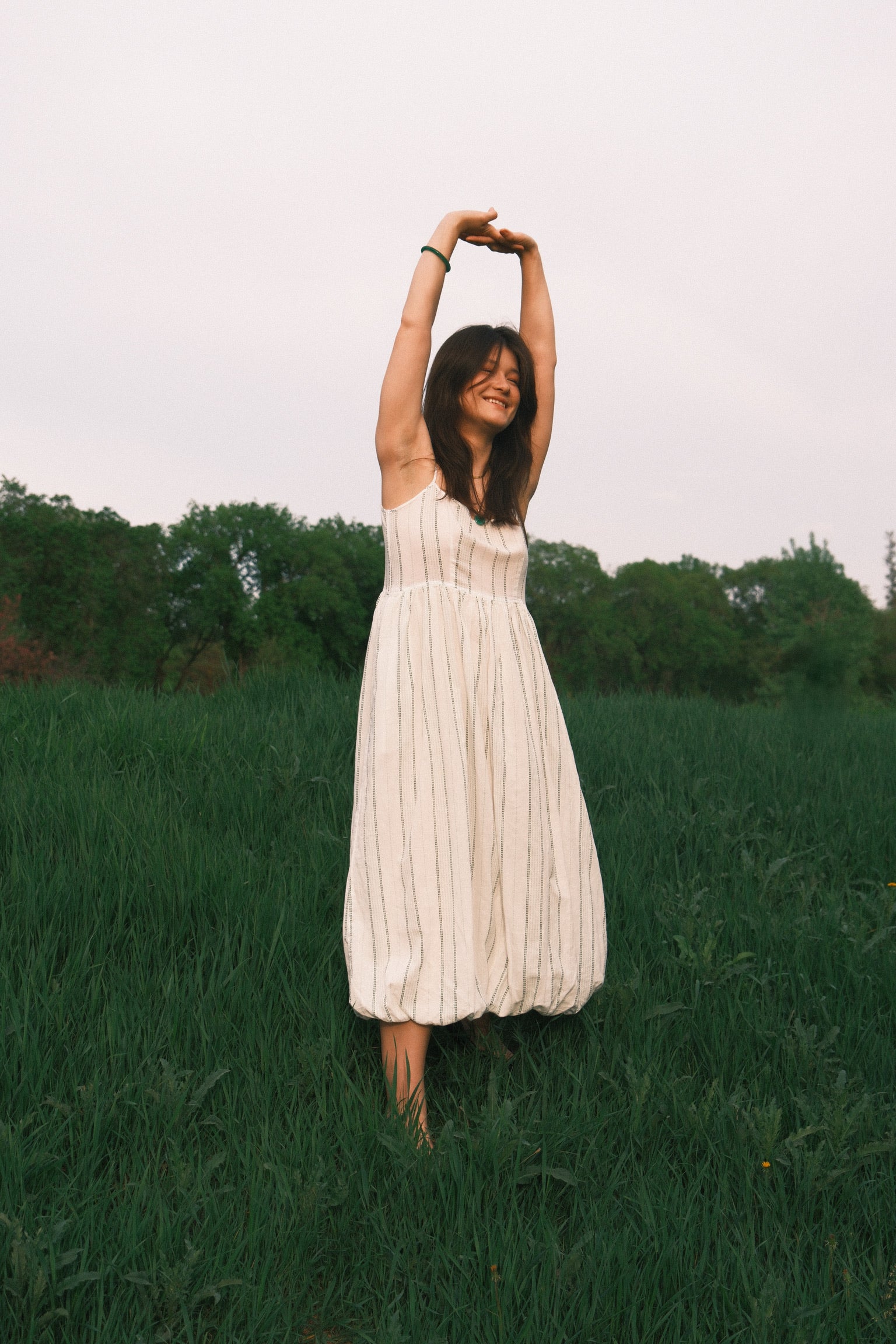 Utku Barrel Dress in Turquoise Green/Viridian Green/Lily White — sunny day at the park