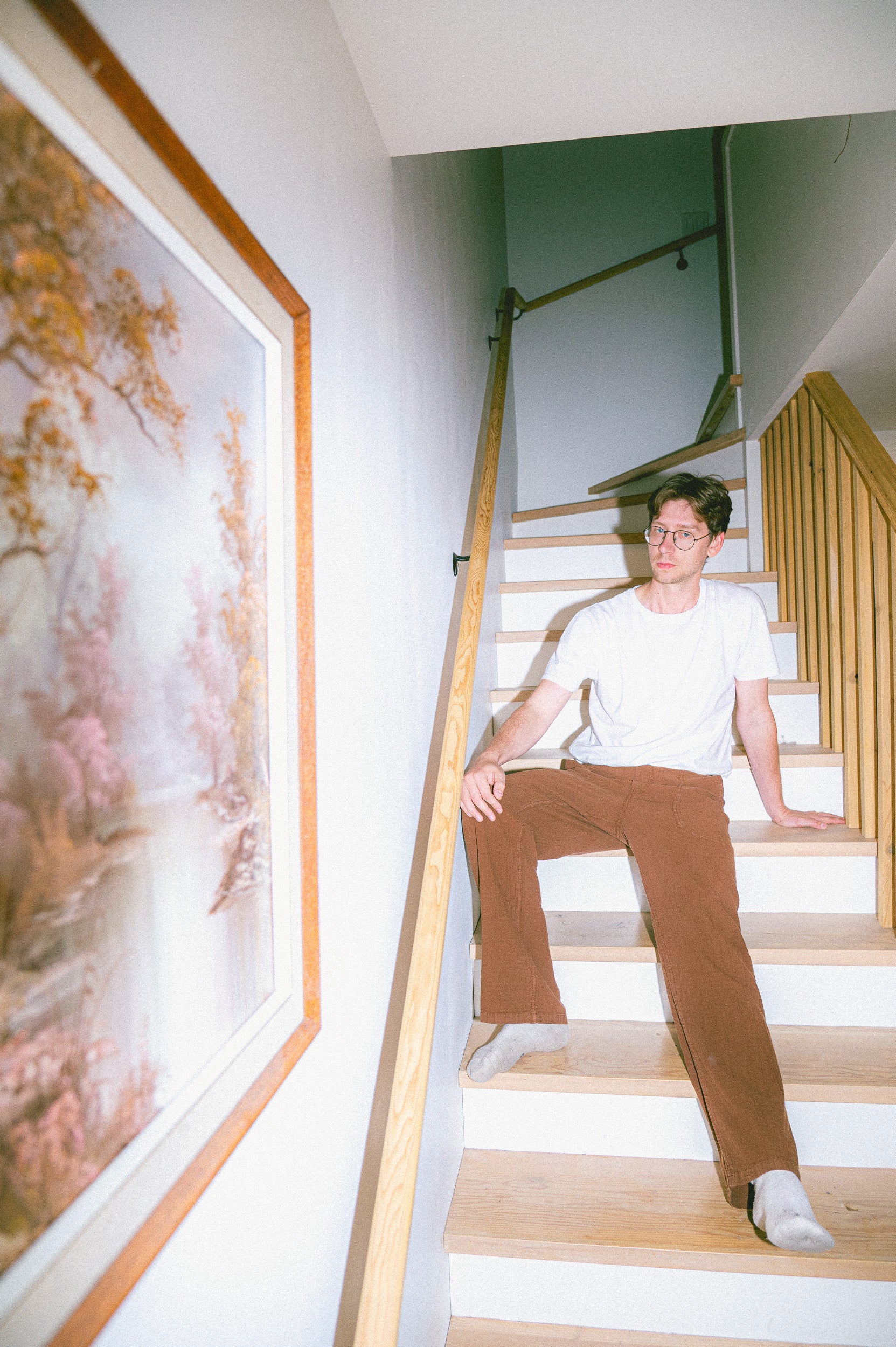 Model wearing Utku Straight Pants in Tobacco Brown