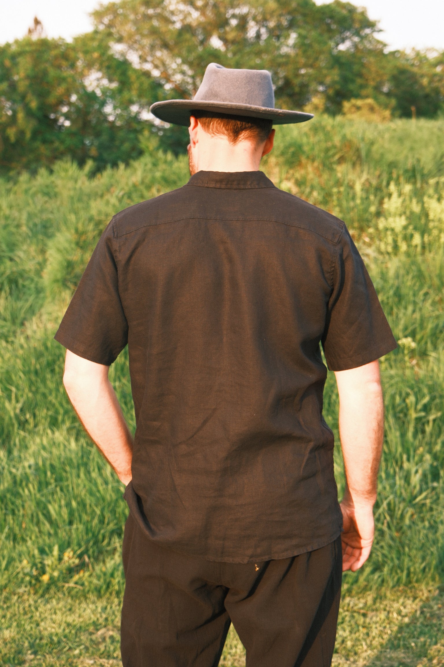 Utku Camp Linen Shirt in Black — front view, relaxed linen fit