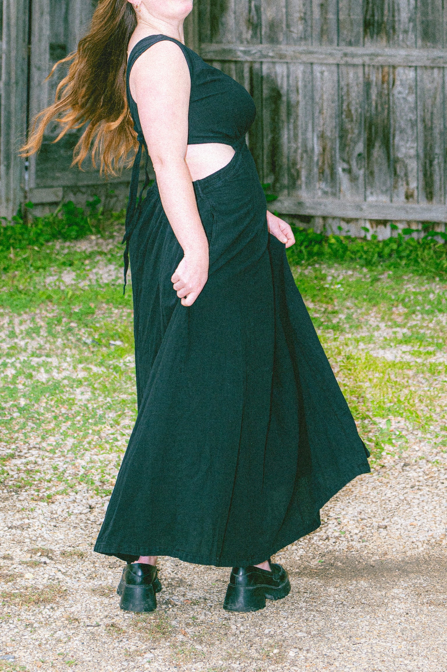 Model wearing Utku Cutout Dress in Black — handmade in Ecuador