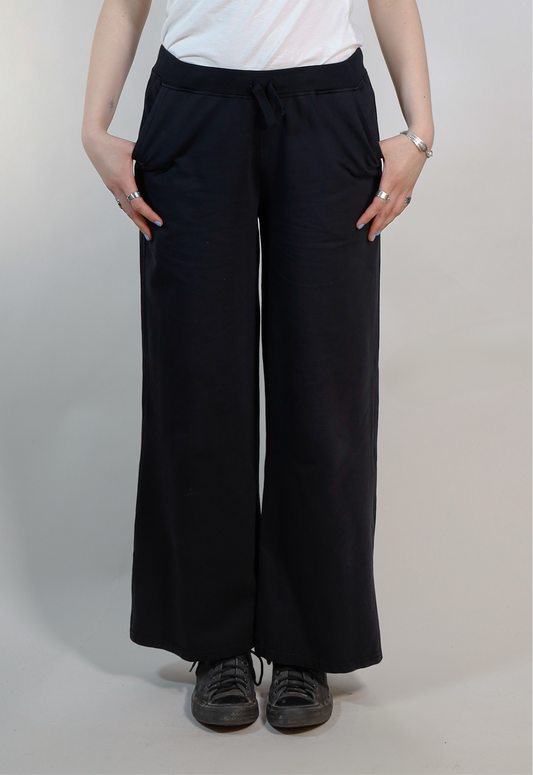 Model wearing Utku Wide-Leg Lounge Pants — organic cotton