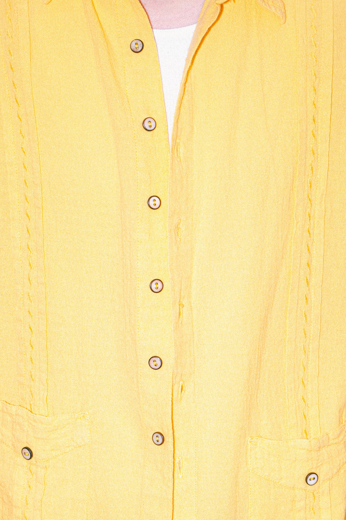 Model wearing Utku Modern Guayabera in Apricot Yellow — handmade in Ecuador