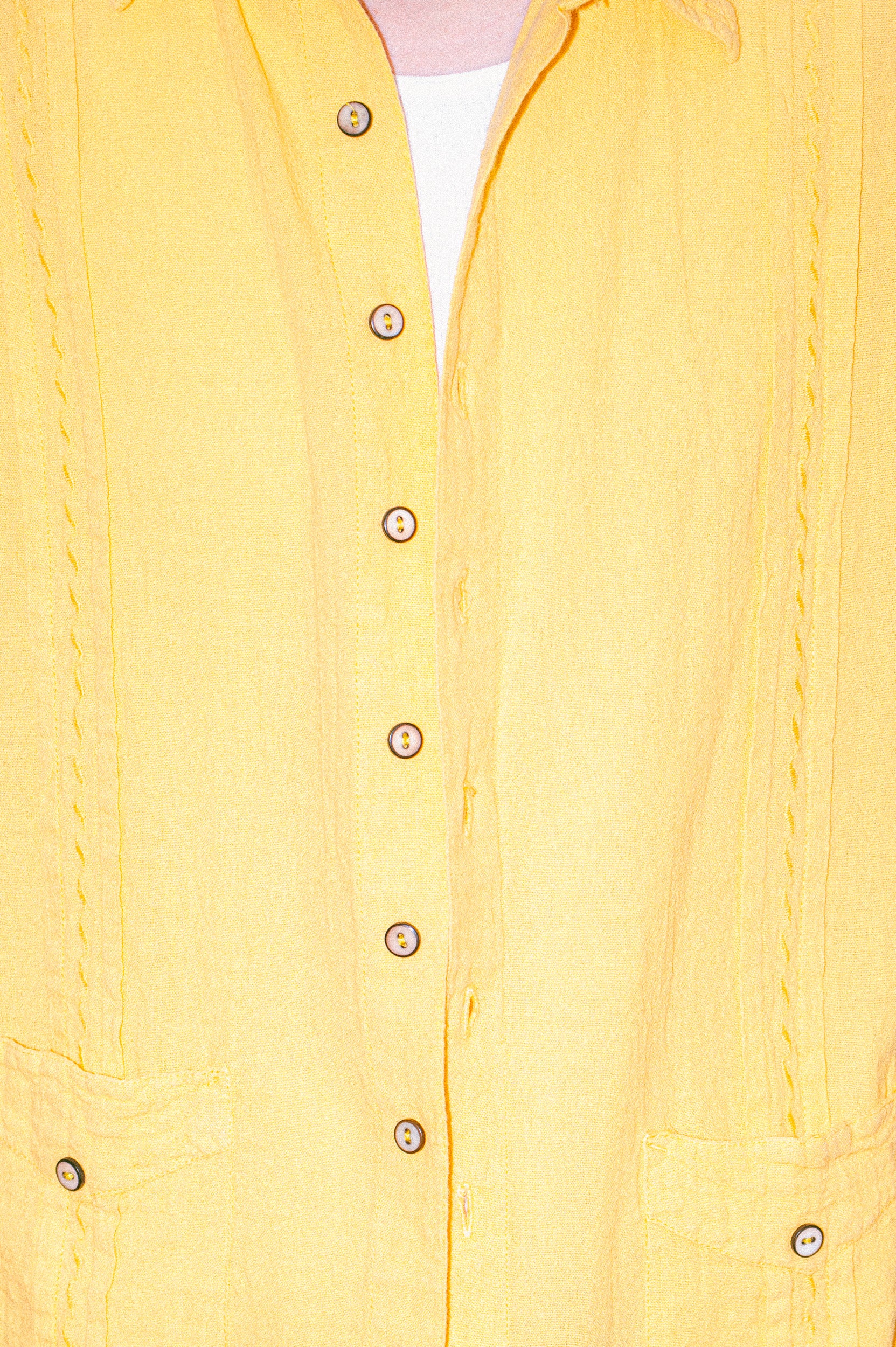 Model wearing Utku Modern Guayabera in Apricot Yellow — handmade in Ecuador