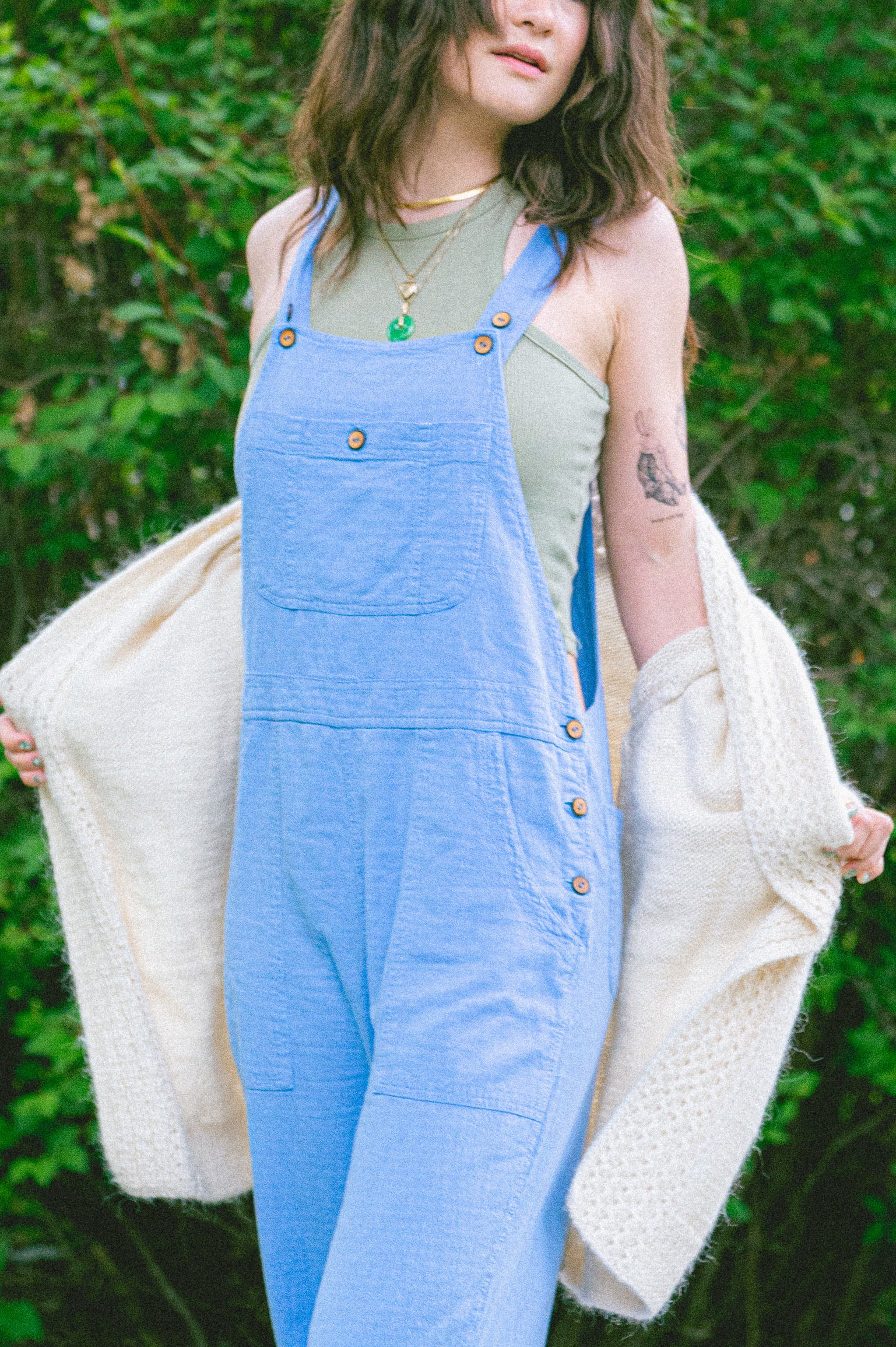 Model wearing Utku Crinkle Cotton Overalls in Olympic blue — handmade in Ecuador