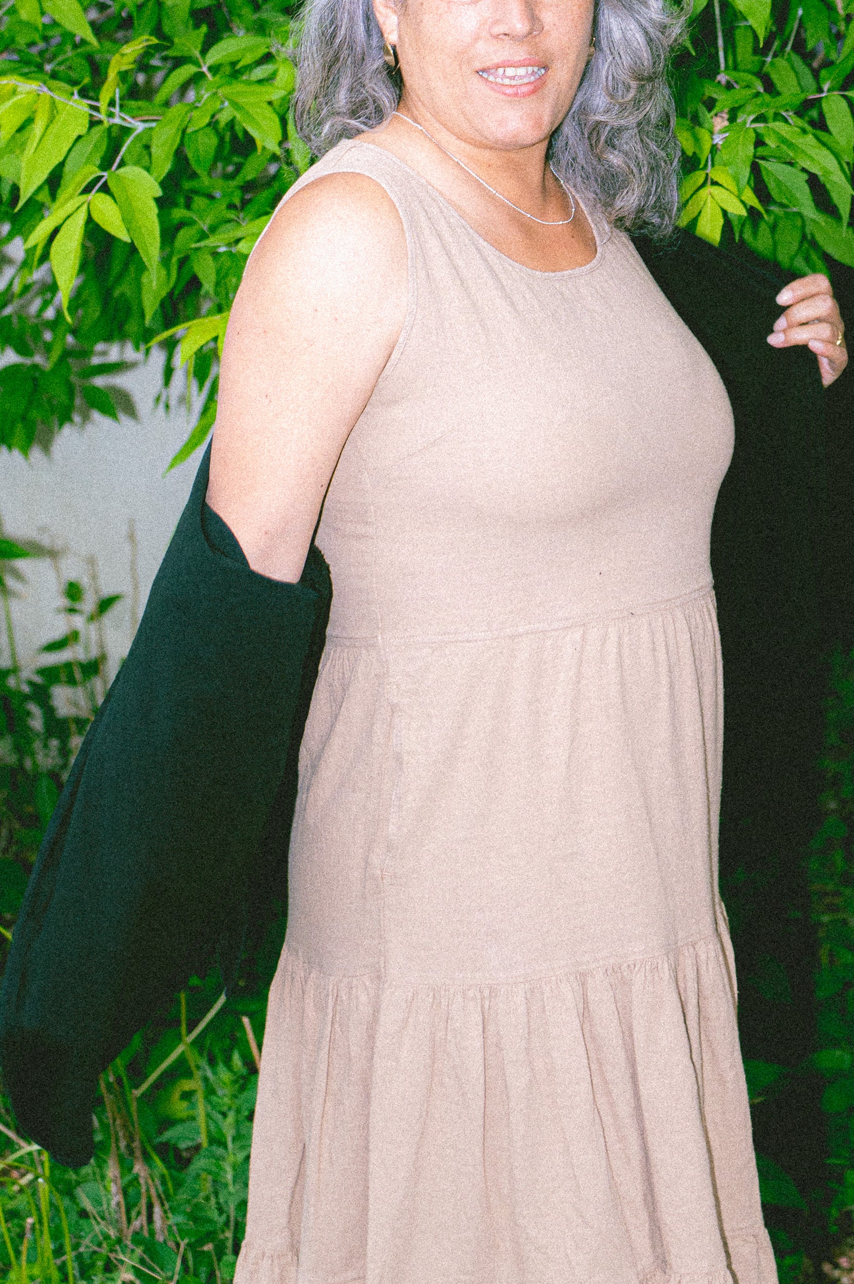 Model wearing Utku Tiered Dress in Ivory buff — handmade in Ecuador