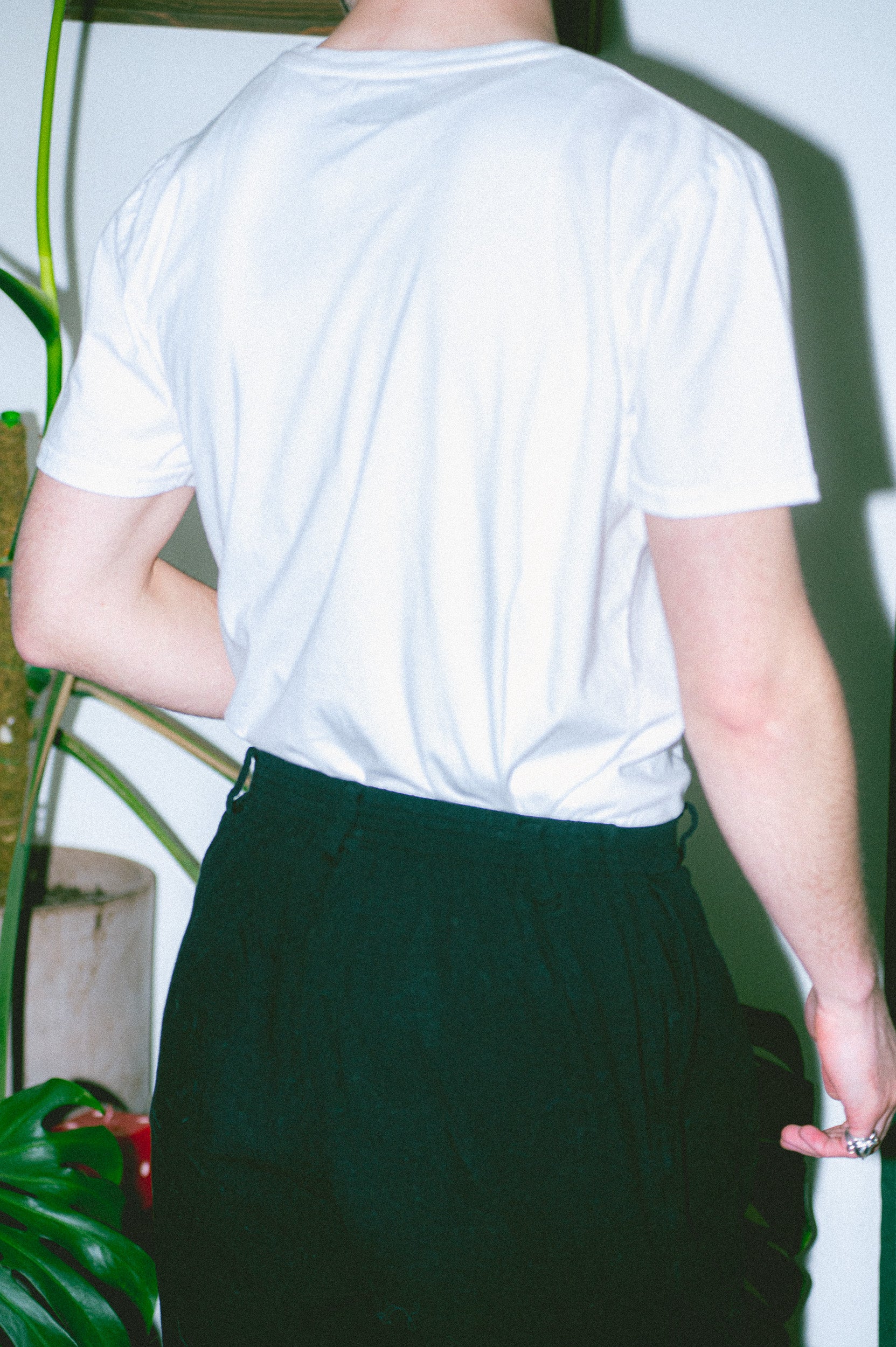 Utku Pleated Crinkle Cotton Pants in Black — back view