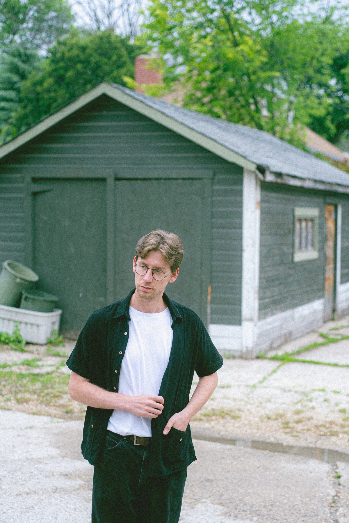 Model wearing Utku Modern Guayabera in Black — handmade in Ecuador