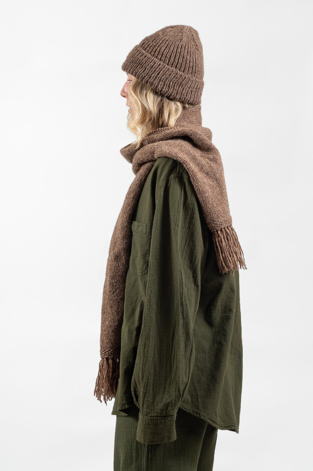 Model wearing Utku Alpaca Wool Scarf in Tobacco brown