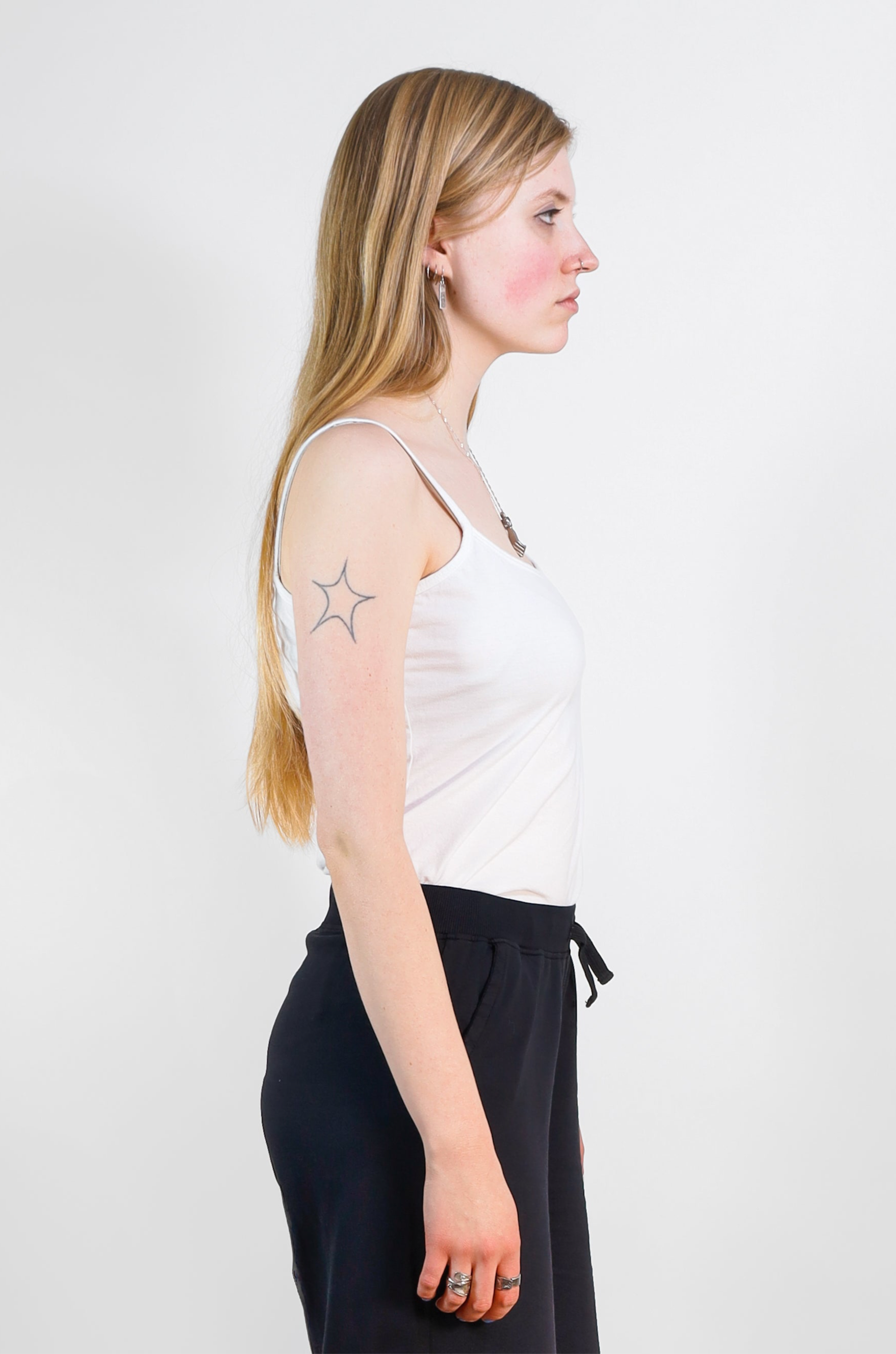 Model wearing Utku Classic Tank in White — handmade in Ecuador