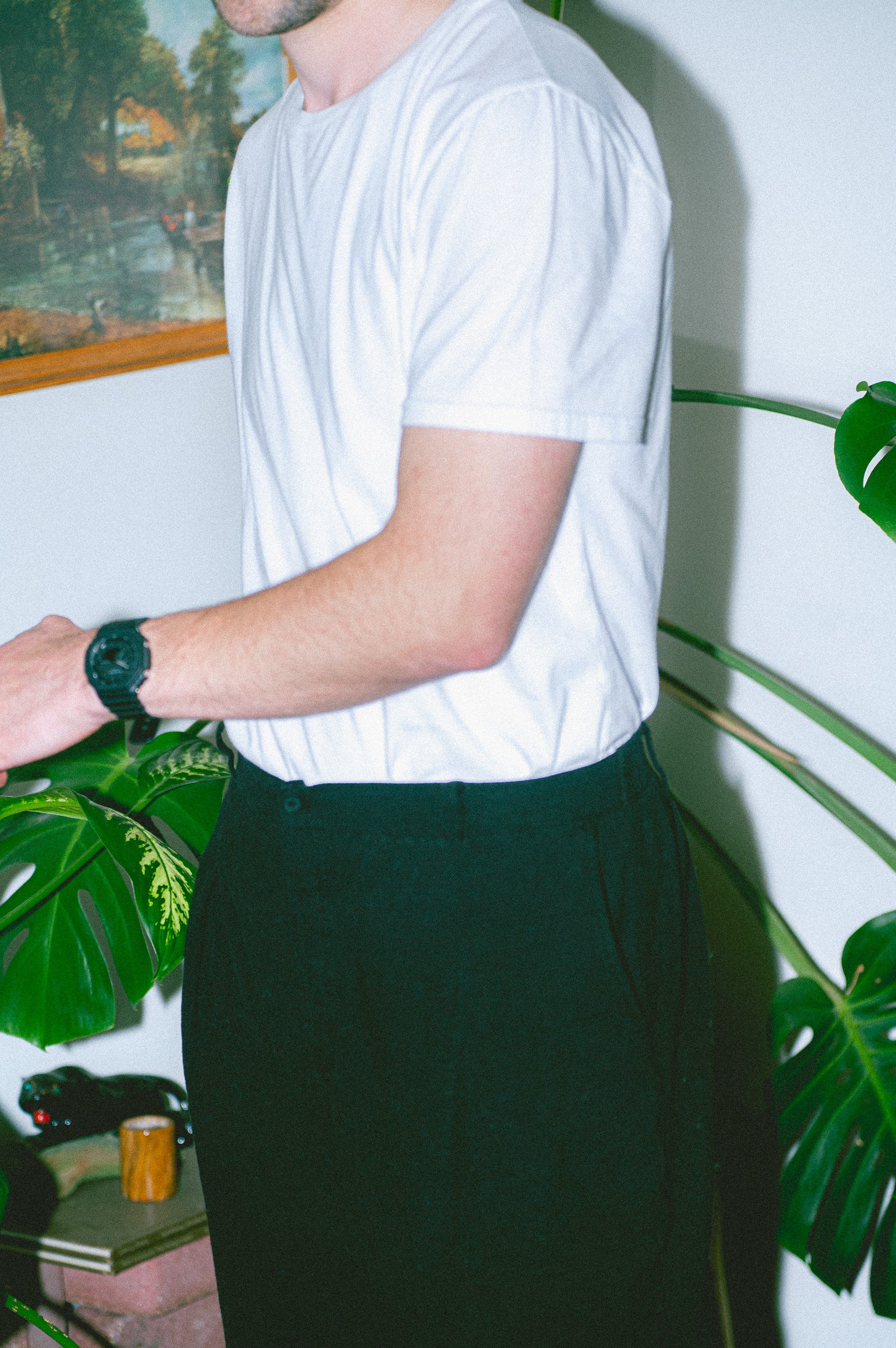 Model wearing Utku Pleated Pants in Black