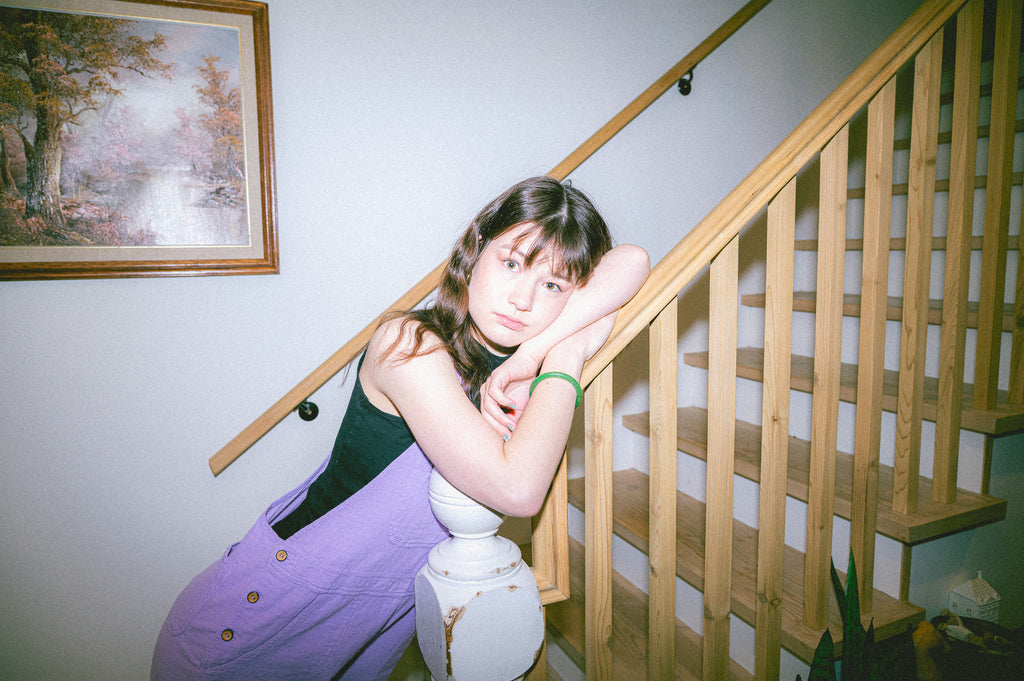 Model wearing Utku Crinkle Cotton Overalls in Lilac — handmade in Ecuador