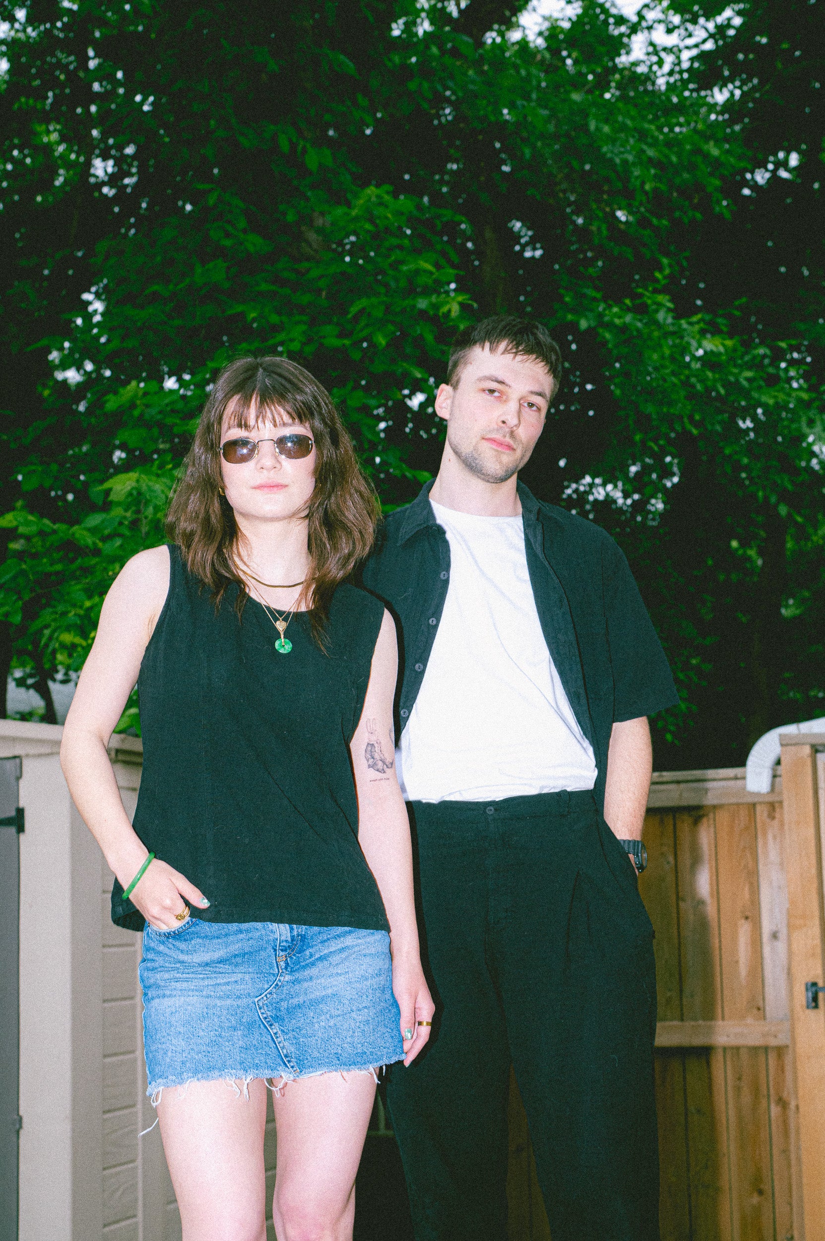 Model wearing Utku Short Sleeve Crinkle Cotton Shirt in Black
