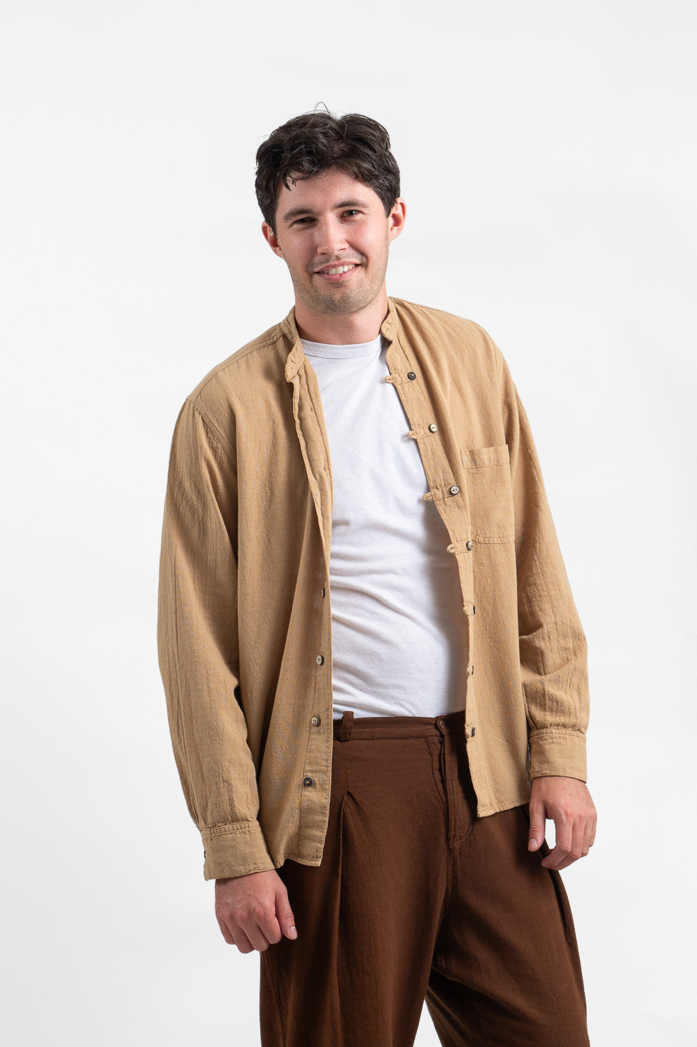 Model wearing Utku Fabián Shirt in Ivory buff — handmade in Ecuador