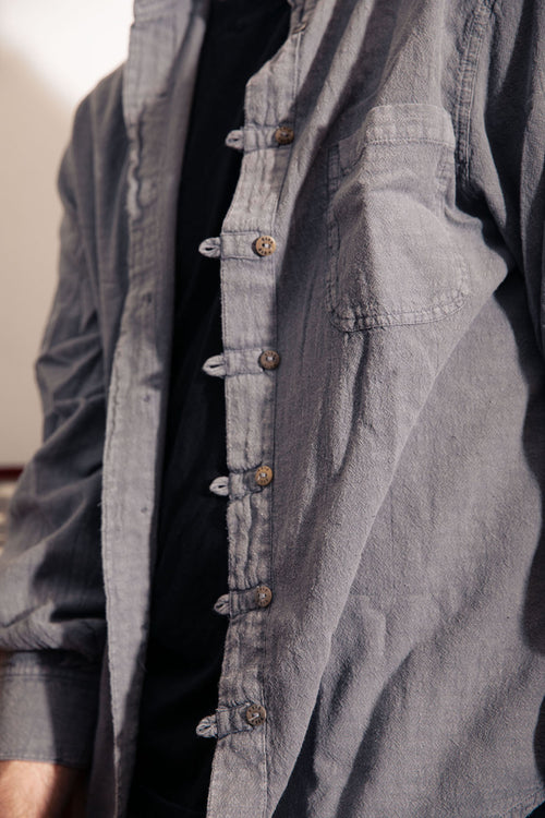Model wearing Utku Collar Shirt in Deep charcoal — handmade in Ecuador